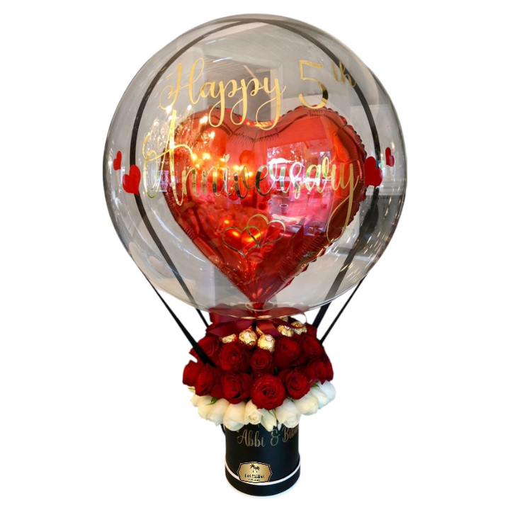 ❤️🎈 Globo Burbuja con Rosas Rojas y Chocolates para Aniversario – Las Palmas Floristería Bogotá 🎈❤️